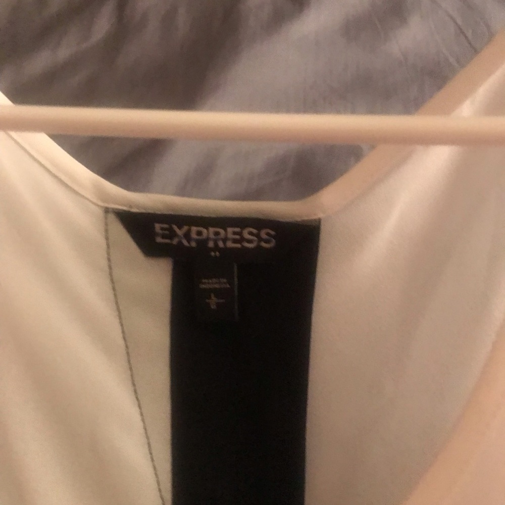 Express cute tank with cute opening in back, never worn